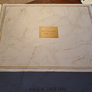 Elegant Cream Gift Box with Gold Accents